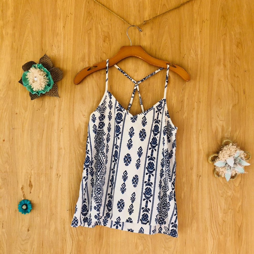 A white tank with navy patterns